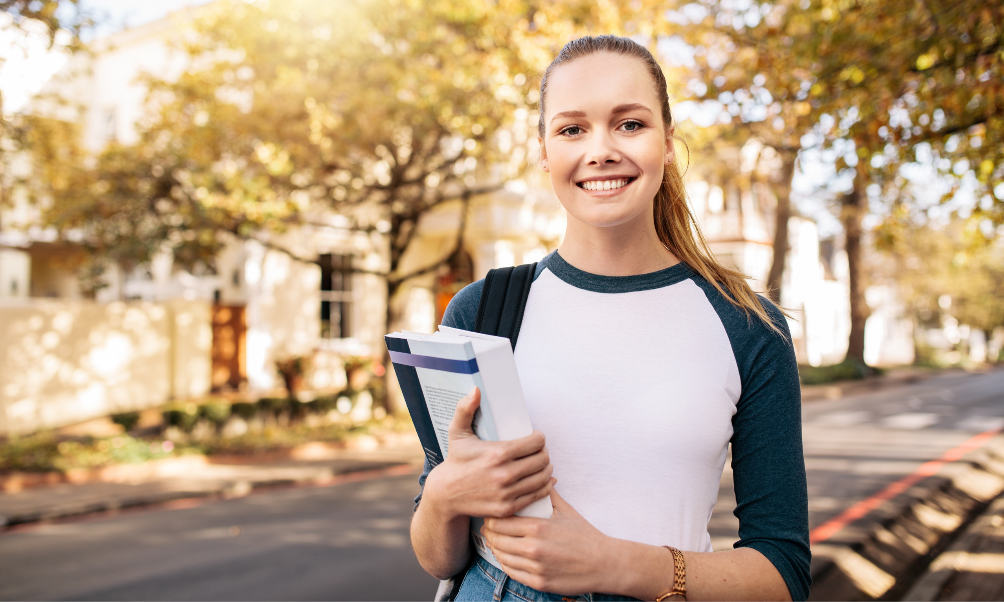 Best Ivy League Admissions Consulting Firms About Us | Student walking on campus | Best Ivy League Consultants