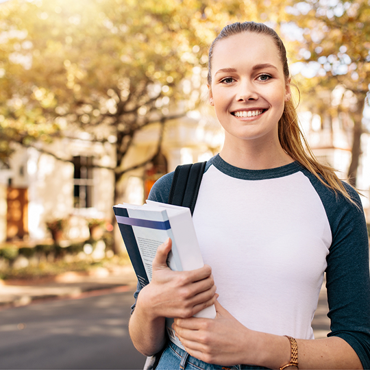 Best Ivy League Admissions Consulting Firms Ivy Summit | Student walking on campus | Best Ivy League Consultants